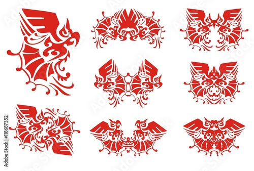 Fototapeta Naklejka Na Ścianę i Meble -  Flaming ornate parrot and double parrot symbols. Set of decorative parrot symbols for your design. Red on white