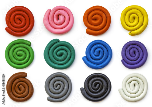 Set of plasticine palettes. Handmade spirals with shadows isolated on white background. Templates spots of modelling clay.