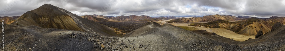 360 degree panorama view over the lava field of Laugahraun and the colorful mountains of Landmannalaugar, Iceland, seen from the volcano of Blahnukur. 360 degree panorama view over the lava field of Laugahraun and the colorful mountains of Landmannalaugar, Iceland, seen from the volcano of Blahnukur.