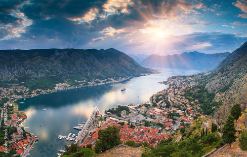 Panoramic landscape Kotor bay in Montenegro at sunset. Dramatic evening light. Balkans, Adriatic sea, Europe. View from the top of the mountain. photo