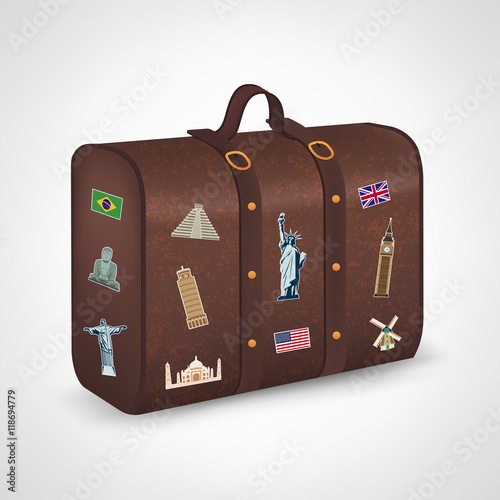 Vintage suitcase with collection of travel labels. Travel and Tourism. Vector