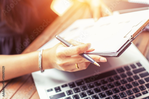 Business team working on laptop, while sitting at office. Busine