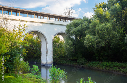 Aqueduct bridge across the river photo