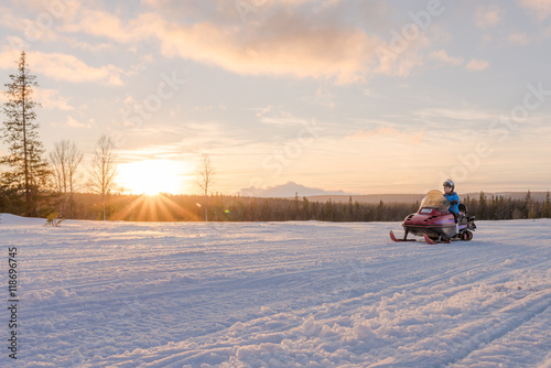 Woman Riding Snowmobile, Inspirational Scene