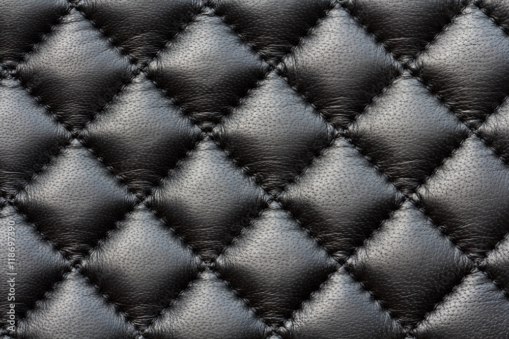 Fototapeta premium black leather texture, sewn stitches, macro