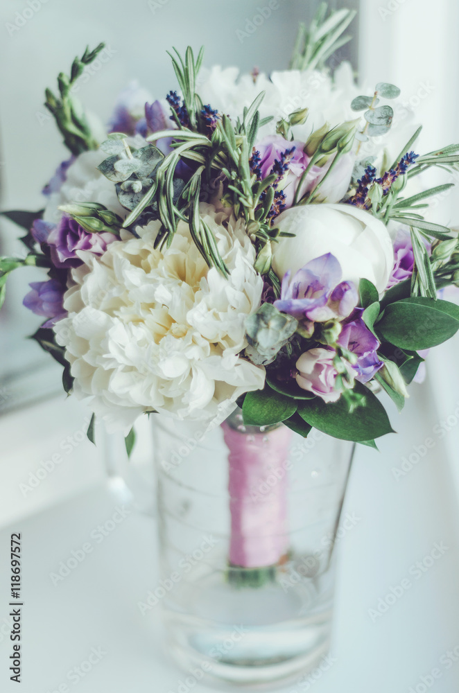 Obraz premium Beauty white peony, lilac lavender, roses flower in vase. Pastel floral wallpaper, wedding background. Bridal flowers. Bouquet of bride. Marriage. Card, text place, copyspace.