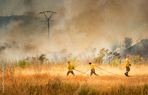 Firefighters fighting fire.