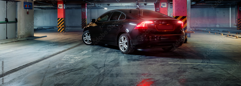 Black car in underground parking