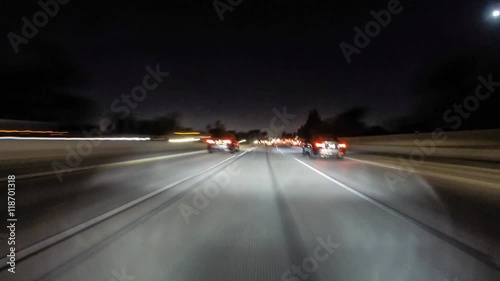 Night driving car mount time lapse on the 118 and 405 Freeways in the San Fernando Valley area of Los Angeles, California. photo