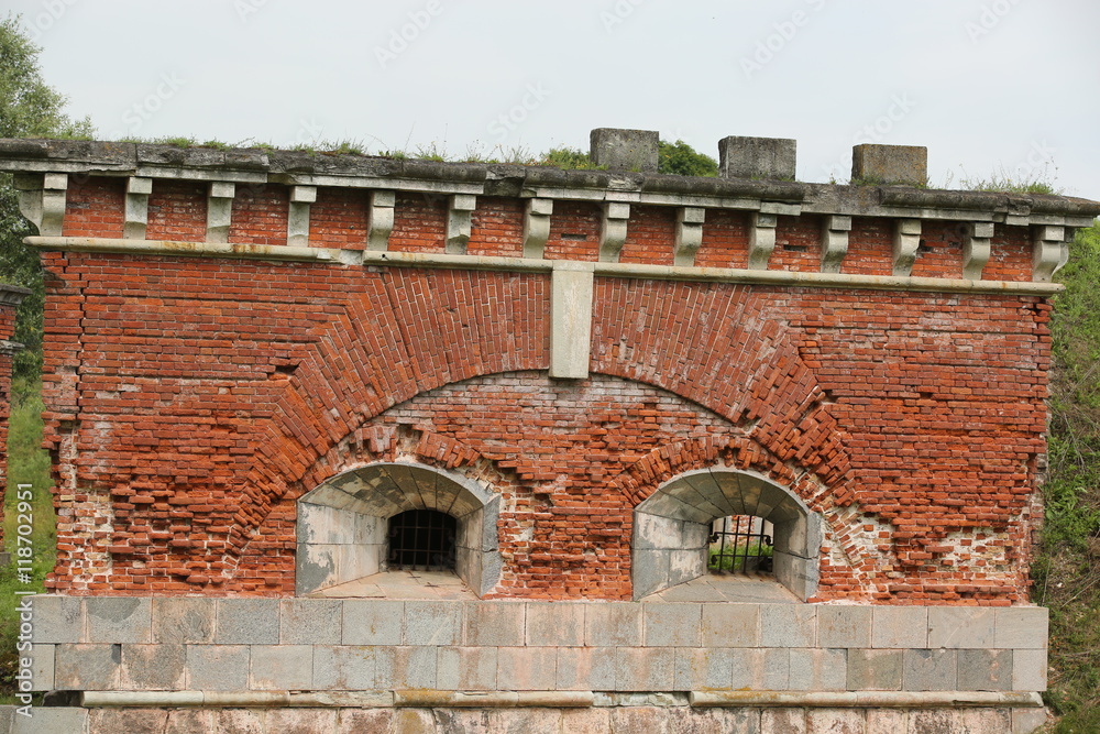 Fototapeta premium Buildings of 19th century from red brivk