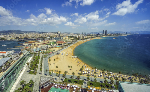 View of Salou Platja Llarga Beach in Spain from the last floor of a coast building photo