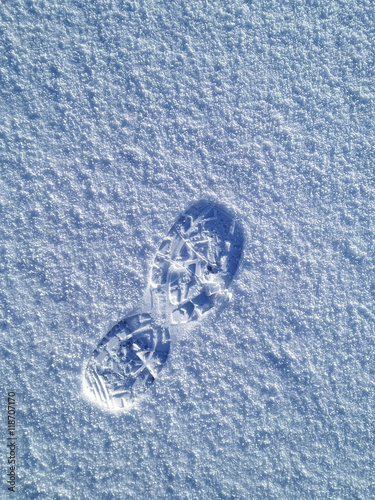 Footprint on the snow © gswozniak