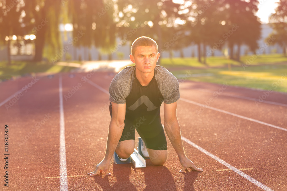 Obraz premium Track runner in starting position