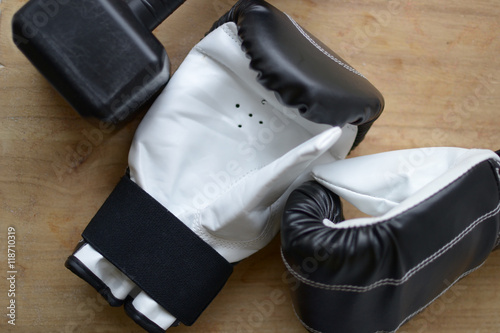 black and white boxing gloves and an old black checkered tag next