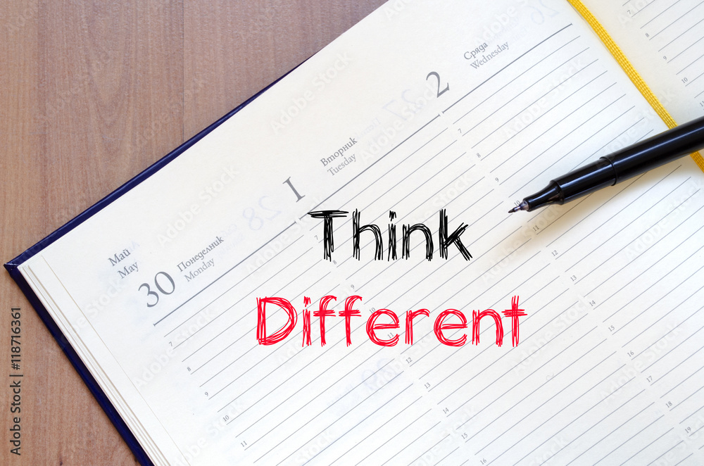 Think different text concept on notebook Think different text concept on notebook