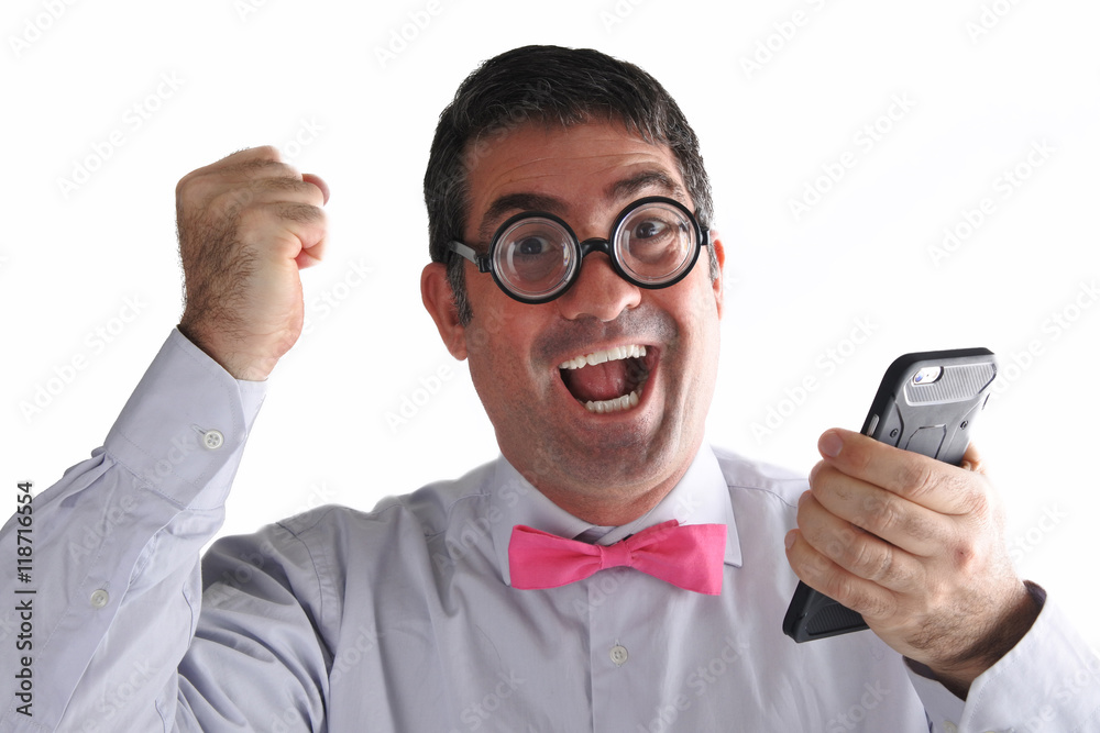 Happy Geeky man receives an exciting message or phone call Happy Geeky man receives an exciting message or phone call