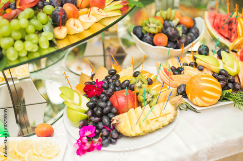 Authentic buffet, assorted fresh fruits, berries and citrus. Preparation for design creative menu