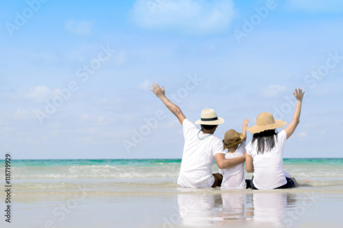 Happy Family Having Fun on Beach