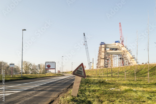 NOVI SAD, SERBIA - DECEMBAR 22, 2014: Construction of the bridge on the Danube River photo
