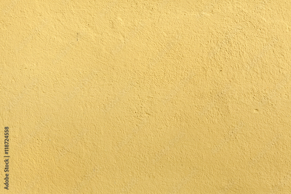 Yellow painted stucco wall. Background texture Yellow painted stucco wall. Background texture