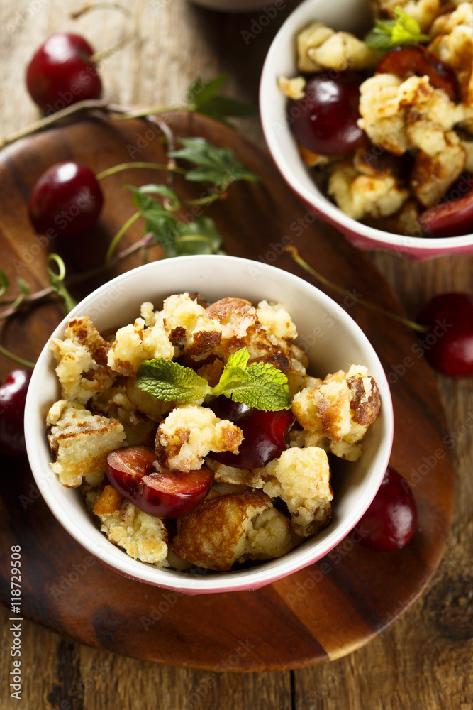 Austrian pancake dessert with cherries