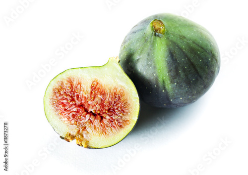 Whole fresh figs and one slice of fig