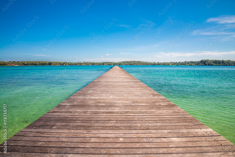 Long wood bridge on beautiful tropical island beach summer holiday - Travel summer vacation concept