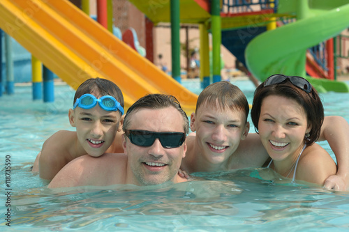 Happy family having in pool