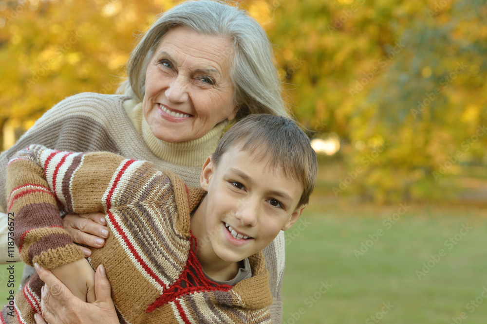 Fototapeta premium Grandmother with boy in park