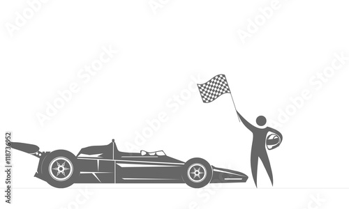 The winner of the race near the sports car racing with flag in hand.