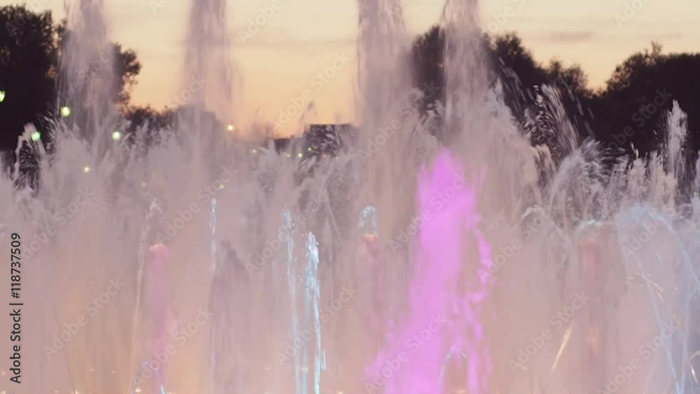 Water Jets in a Fountain With Colorful Lights, Evening Time, Tsaritsyno Park, Moscow, Russia Water Jets in a Fountain With Colorful Lights, Evening Time, Tsaritsyno Park, Moscow, Russia