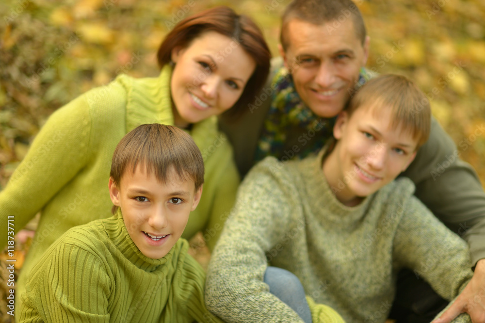 Happy family in autumn forest Happy family in autumn forest