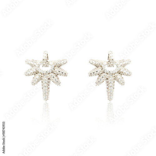 Pair of silver diamond earrings isolated on white