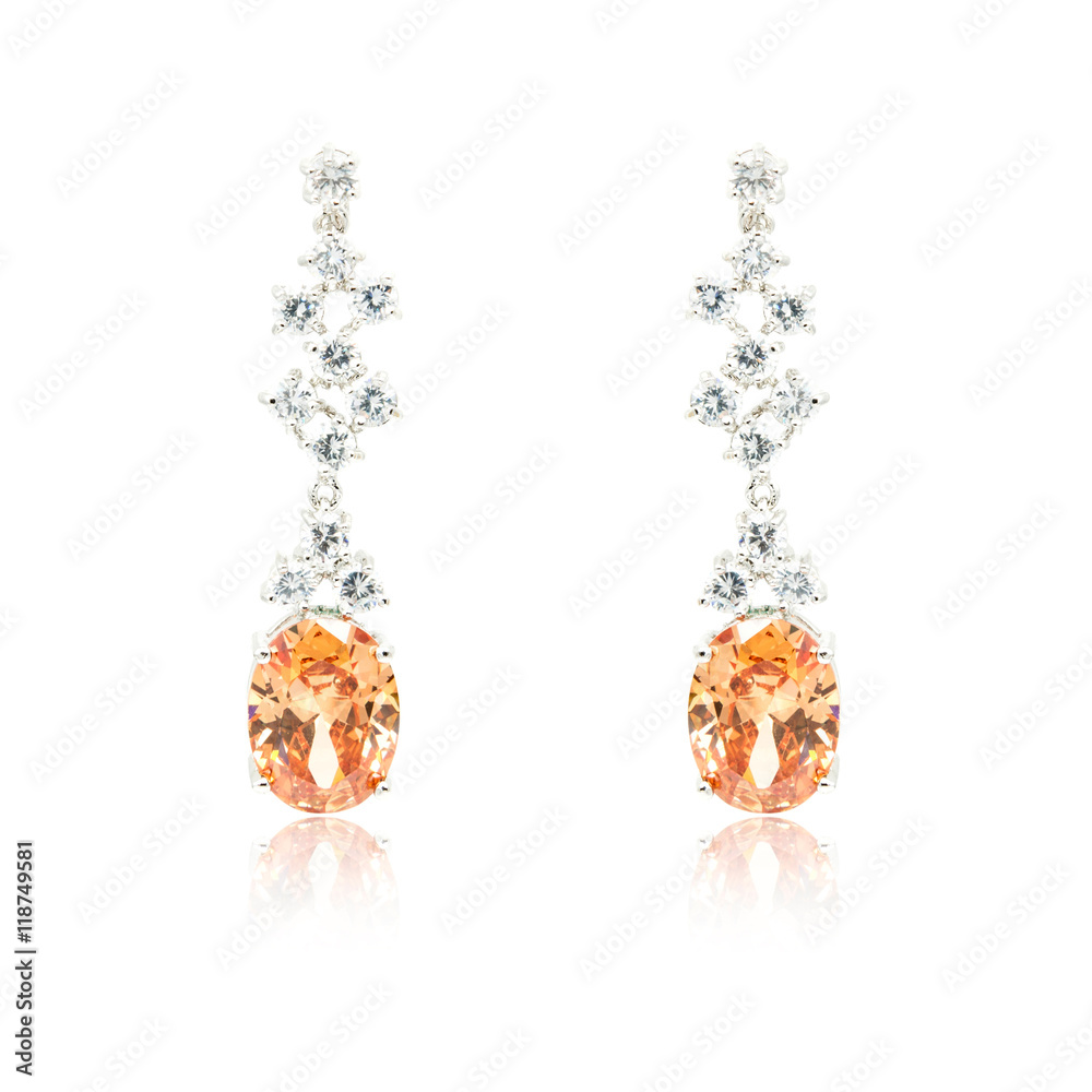 Pair of diamond earrings isolated on white