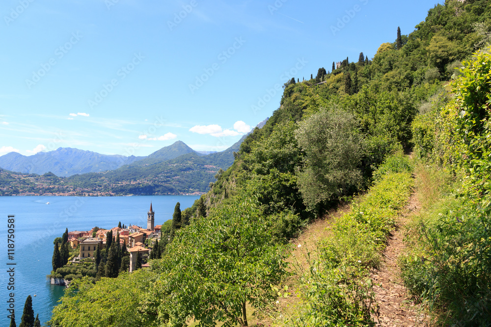 Hiking path and panorama of lakeside village Varenna at Lake Como with mountains in Lombardy, Italy