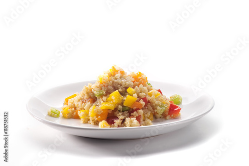 Close up of colored quinoa salad with vegetables