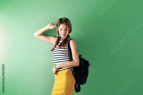 Beautiful girl on green bac...