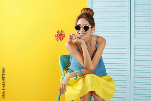 Beautiful girl with candy o...
