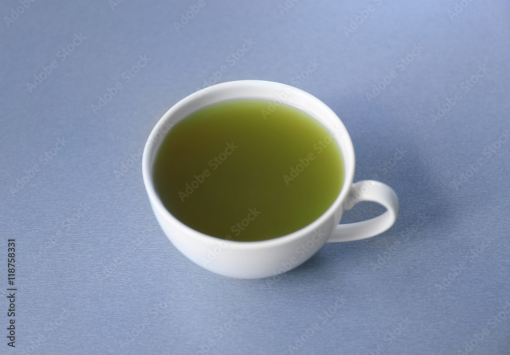 Cup of green matcha tea on color background Cup of green matcha tea on color background