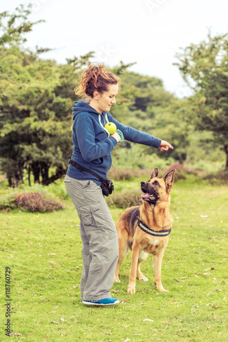 woman trainer together with dog © marcin jucha