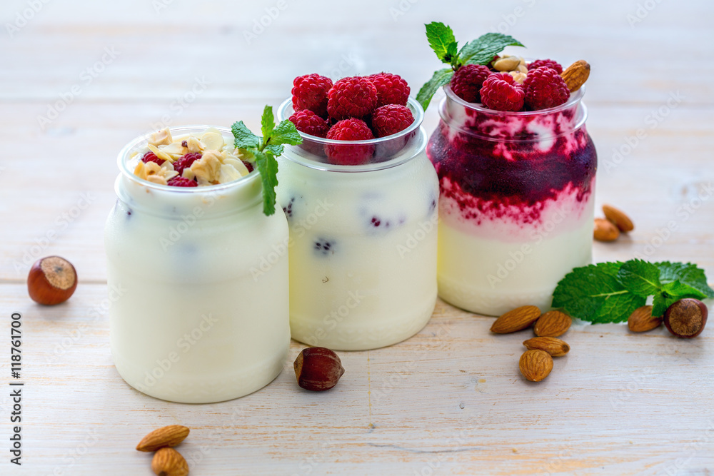 Jars with homemade yogurt. Jars with homemade yogurt.