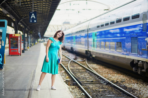 Young woman in Parisian underground or railway station