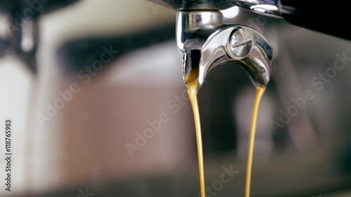 Coffee pours out of the tap coffee machine