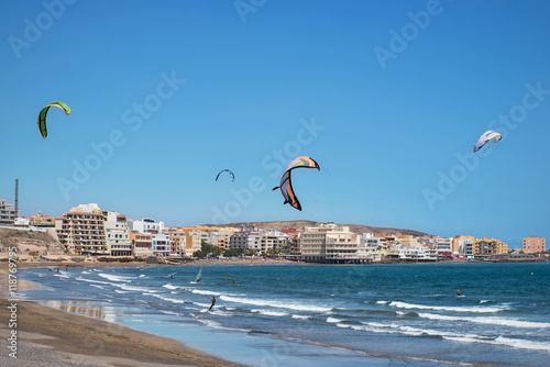 EL MEDANO, TENERIFE - FEBRUARY 16: Kitesurfers in el Medano Beach on February 16, 2016. El Medano beach is a world famous place for kitesurfing and surfing.