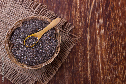 Chia seeds with wooden spoon