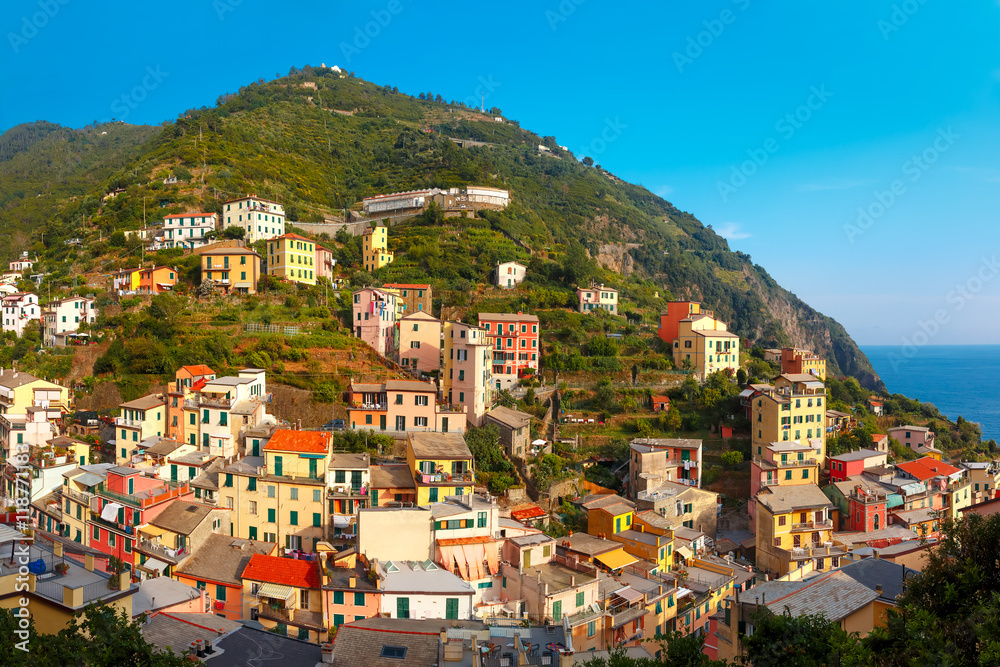 Panoramic view of Riomaggiore fishing village in Five lands, Cinque Terre National Park, Liguria, Italy.