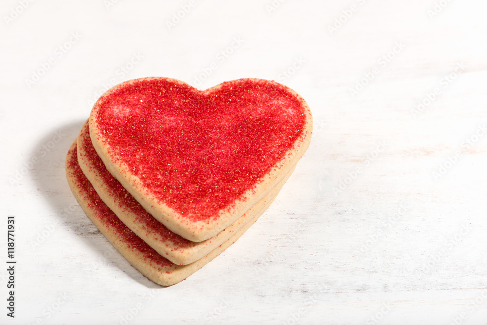 heart shaped cookies for Valentine's Day arranged and isolated on white board, close up, macro, selective focus, horizontal heart shaped cookies for Valentine's Day arranged and isolated on white board, close up, macro, selective focus, horizontal