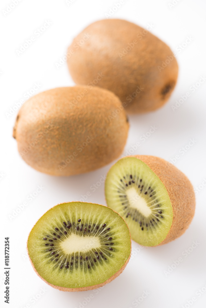 kiwi fruits, fresh cut, close up, vertical, isolated on white kiwi fruits, fresh cut, close up, vertical, isolated on white