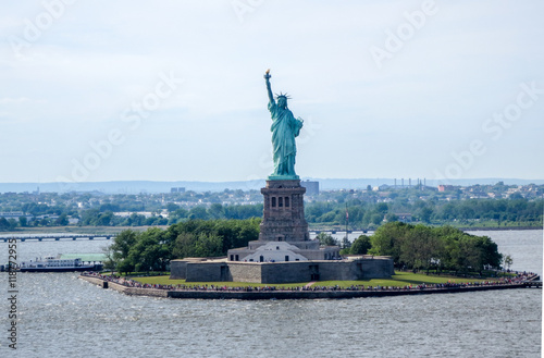 The Statue of Liberty stands tall overlooking the Hudson Bay