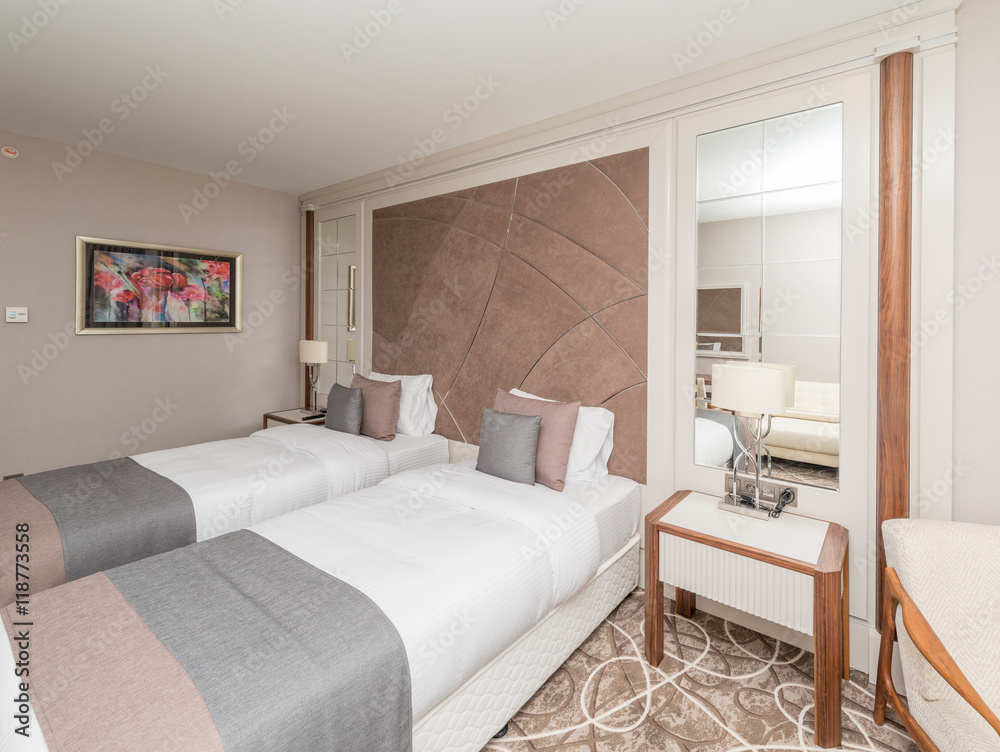 Fototapeta premium Modern hotel room with big bed